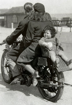 SINGLE CARD - Family of three on motorbike,1932