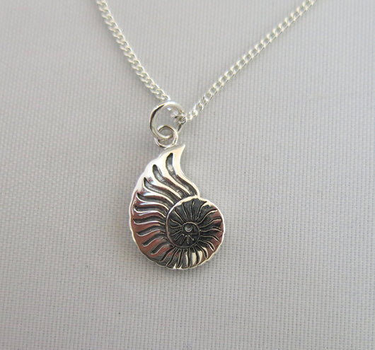Sterling Silver Ammonite design pendant and chain.